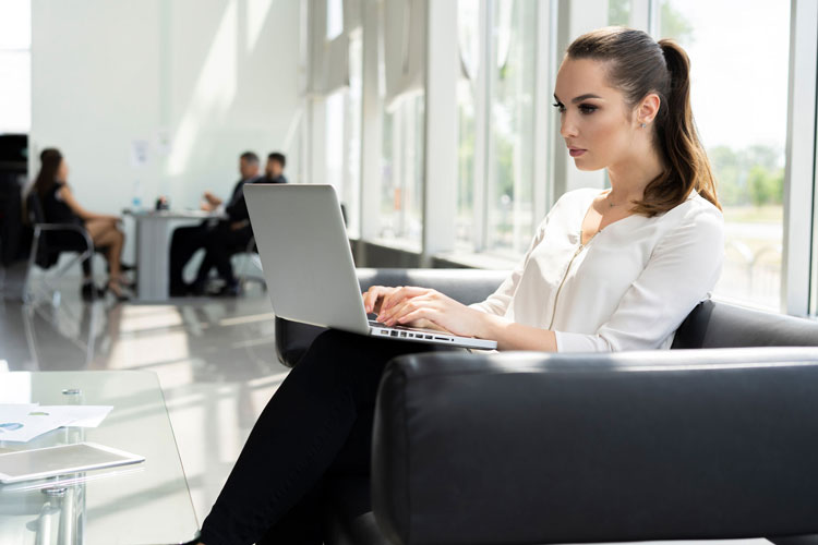 woman working on a laptop